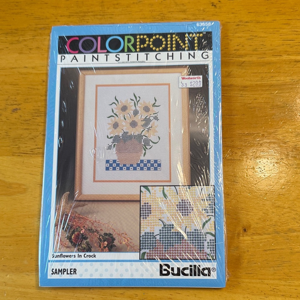 Vintage Bucilla color point paint stitching sampler. Sunflowers in crock. New